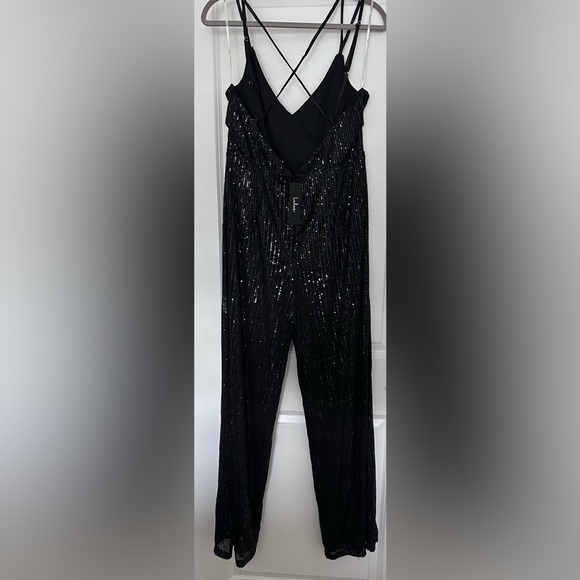 Lulu’s “Isn’t It Iconic Black” sequined wide leg jumpsuit. Never worn, has tags - Picture 4 of 8
